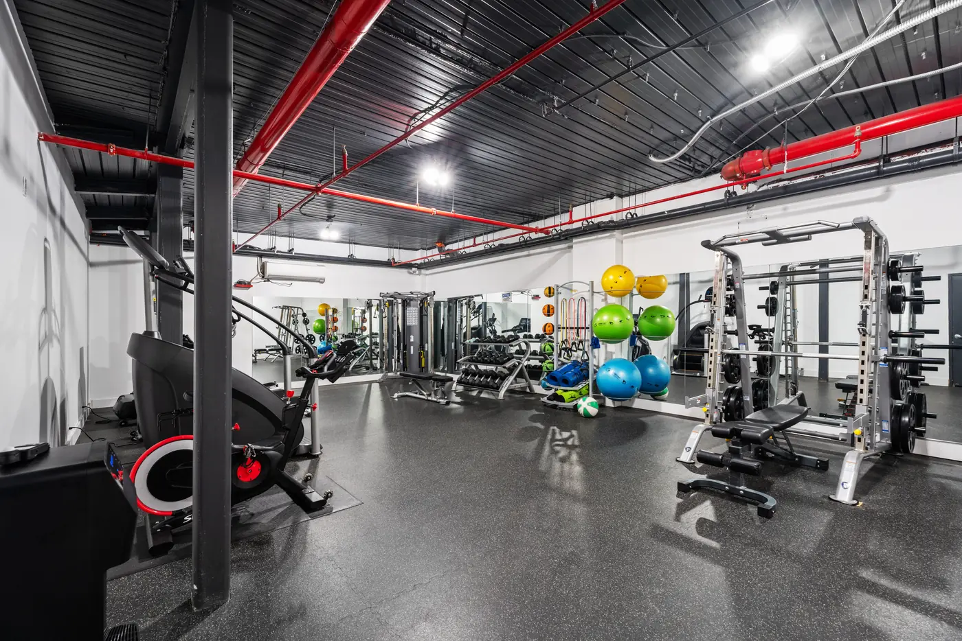 Commercial fitness center photographed for a New York City property listing.